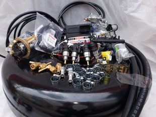 Комплект ГБО 4 Stag Q-Box Plus Tomasetto Nordic форсунки Hana баллон 42л под запаску 00017 фото