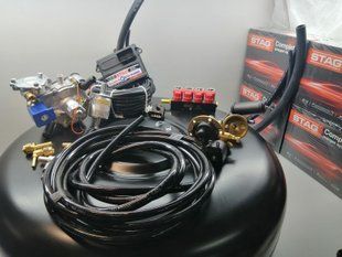 Комплект ГБО 4 Stag Q-Box Basic Tomasetto Nordic форсунки Valtek баллон 42л под запаску 00491 фото