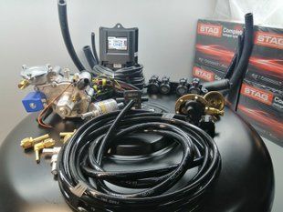 Комплект ГБО 4 LPGTech One Tomasetto Nordic форсунки AEB баллон 42л под запаску 00522 фото